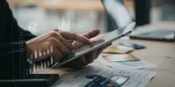 Financial charts on tablet, credit cards, representing debt consolidation strategies for 2026.